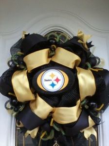 Helps that the Steeler logo is surrounded by gold ribbon. What Steeler fan wouldn't want this?