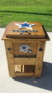 Yes, it's cooler even though it's made of wood siding and resembles an end table and a wooden chest. Yes, those Cowboys fan can be pretty creative.
