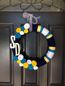 Yes, it might look like an ordinary wreath but it says "SD" and it's in Chargers colors. Love the flowers.