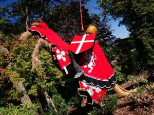 Yes, his horse might be made from a tree or straw. But he looks so cool in his red knightly attire.
