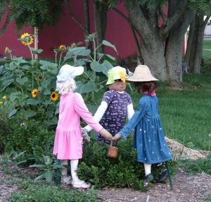 Well, I guess children scarecrows take up less straw. But you have to appreciate this concept. So cute.