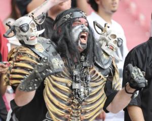 Yes, I know real rib cages on humans don't look like that. But I don't think this guy gives a shit. Also, the skulls have swords stabbed through them.