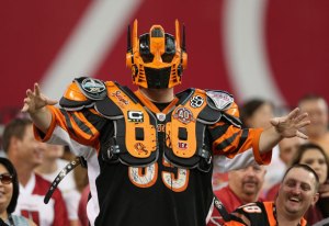 He even has the shoulder pads and jersey to match. Which begs the question for me.