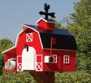 Yes, it's another barn mailbox. But this one looks different and has a more shinier look to it. Couldn't pass it up.