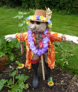That or on his way to a Jimmy Buffett concert. Wonder if there are people in Hawaii who have scarecrows in their gardens.