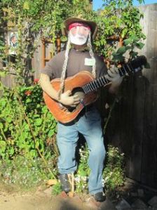 That's a very good Willie Nelson scarecrow. The braids are excellent. Brilliant.