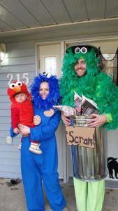 Well, he's Oscar the Grouch. Yet, he and Cookie Monster sure have fuzzy heads.