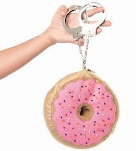 Hmmm...donuts and handcuffs. wonder what they have in common. Oh, I get it, both are associated with police.