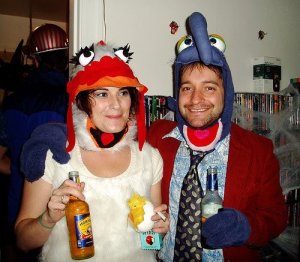 You understand she's a chicken. And it seems these two are drinking and smoking at this party.