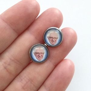 Because there's nothing more stylish than wearing earrings with an old man's face on them. Yeah, that's ridiculous.