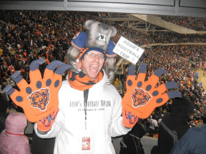 Here is this guy with foam paws and a bear hat. And he seems really psyched up for the game.