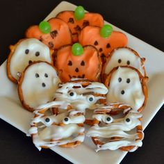 These consist of jack-o-lanterns, ghosts, and mummies. The last one is all in wraps with icing.