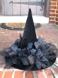 This one has feathers, ribbons, and flowers on it. Great for any witch on the town.