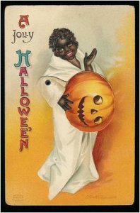 I think it would've been better if the kid just kept his pumpkin hat on. Because he's a walking racist stereotype. Of course, you must expect these things from vintage cards.