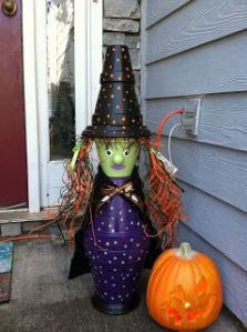 Doesn't hurt she has a flower pot hat to match. And that she's near a pumpkin.