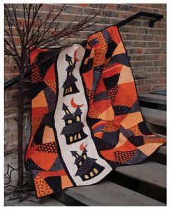 And it has orange and black funky patchwork for your desires. Love the haunted house on this, too.