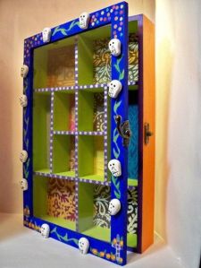 Seems like it was straight out of IKEA before being brightly painted. Of course, there are skulls on the border.