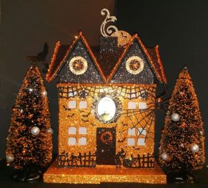 Notice how the orange glitter brings out the cobwebs. Love the roof on this, too.