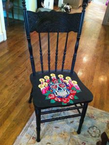 This one has a skull with roses and candles. Yes, it's a morbid but stunning display on the seat.
