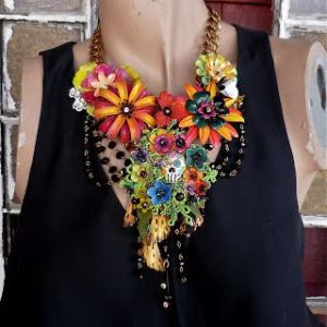 Has a skull in the center but flowers all over the place. Hope it doesn't weigh anyone down.