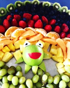 Since he's the one who sings about rainbows in the Muppet Movie. But his head always has to be in the center.