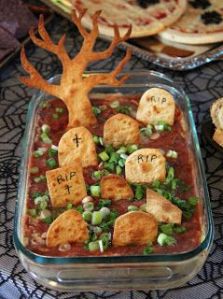At least I think that's salsa dip. The graves stones and tree are made from crackers. Anyway, it'll be a hit.