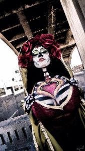 Funny how it's not encased in her skeleton which is normally the case. Love the flowers though.