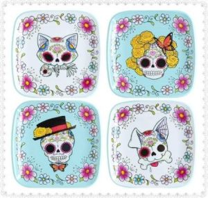 This set features a man, woman, dog and cat. Woman has marigolds for hair and a butterfly decoration.