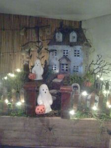 Not sure if those are trick or treaters dressed as ghosts or just ghosts. Sometimes you can't tell on Halloween.