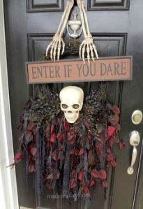 Yes, it's a wreath featuring a skull and bones. But it certainly looks quite scary if you ask me.