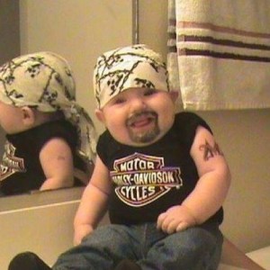 He even has the beard, tattoo, and everything. This is too much.