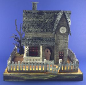 I think this is supposed to resemble Jack Skellington's house from the Nightmare Before Christmas. But I'm not sure.