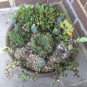 Not sure I want to know who's buried here. But I like how they go with the plants.