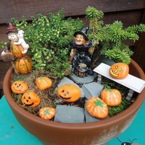 As you can see, the pumpkins in here are just painted rocks. May not seem perfectly symmetrical but seems to work.