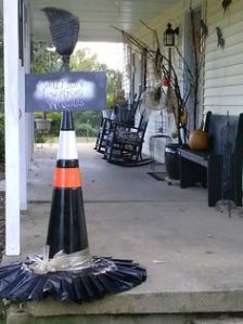 Odd, I'd expect it to be orange so it could be easy to see. Anyway, I do like how it's shaped like a witch hat and the broom on top.