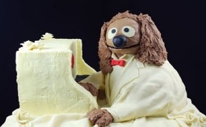 Here he is at a white piano and in a white suit. But he's still typical Rowlf.