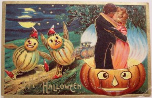 Not sure what's freakier in this picture. Is it the couple making out while the jack-o-lantern doesn't seem to mind? Or the gourd people watching it?