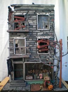 Seems like something people might see on their block. Minus the haunted element. But the windows are boarded just the same.