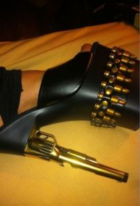 Guaranteed to make you a belle at the NRA convention. Though I hope the gun and bullets aren't operational.