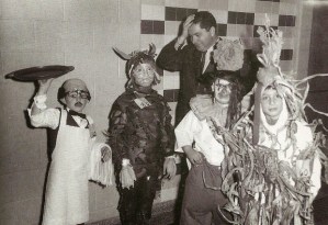 Sorry, but that bald waiter doesn't really stand a chance. Those monsters will eat him alive when they have the chance.