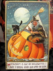 From Tracy's Toys: "Where has she come from, and why didn't she just fly, as would have been traditional? Where is she going, in her broom masted pumpkin boat? Is she a good witch or a bad witch? She's smiling, but I suppose that's not a sure thing: the witch in Hansel and Gretel was probably smiling warmly right up to the time she tried to cook and eat her little visitors. Is that cat safe? Why isn't he in the boat too? I'm worried he's going to fall off. And just how seaworthy is that pumpkin boat? Is there any danger of fish nibbling away the bottom? Won't water come through the face holes? Seems like a major design flaw there. This is definitely a postcard that raises lots of questions."