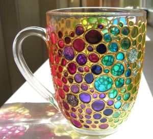 No, this isn't a hallucination. The cup is designed this way with all the colorful bubbles. Not sure if it's an improvement. 