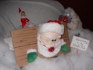 What the hell is he doing to Santa? Why the hell is the Abominable Snowman taking pictures? This is messed up on so many levels.