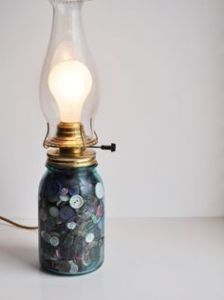 Well, an electric lamp shaped like an oil one. Still, the buttons make it more festive and quaint.