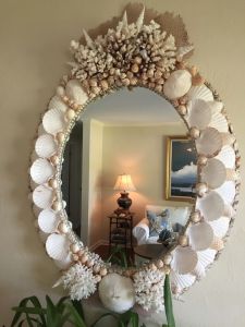 Guess this mirror took a lot of time to make from the looks of it. Yet, it seems perfect for any beach side living room or bedroom.