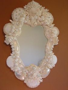 Again, I know I've shown a lot of mirror frames on here. But I assure you this white one does have a pearly finish to it. Lovely.
