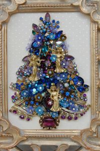 You never know what you can make with recycled jewelry. Love the gold and purple decor.