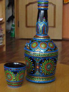 As you can see here, the bottle and glass each are uniquely decorated in the same pattern. Still, I think these are lovely in their own way.