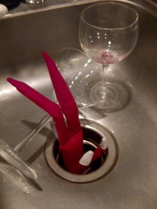 He should hope that this sink doesn't have a garbage disposal. Because he won't last long if it's turned on.