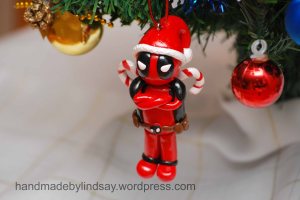 He even has candy canes on the back instead of swords. Also like the Santa hat.